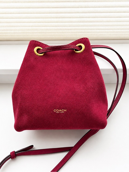 Coach Handbags - New- Coach “Jade” drawstring bag in Fuschia